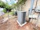 Picture of a modern AC unit and electrical boxes on the side of a home at 7908 Croton Ave, Tampa, FL 33619