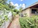 Picture of a backyard with a brick home at 7908 Croton Ave, Tampa, FL 33619