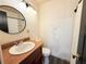 Bathroom features an updated vanity, with bright lighting and plenty of space at 7908 Croton Ave, Tampa, FL 33619