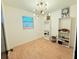 Bright bedroom with modern lighting, shelves and large window offering natural light at 7908 Croton Ave, Tampa, FL 33619