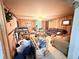 View of a living room needing some TLC, perfect opportunity for renovation at 7908 Croton Ave, Tampa, FL 33619