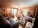 View of a living room needing some TLC, great opportunity for renovation at 7908 Croton Ave, Tampa, FL 33619