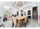 Open-concept dining room with stylish decor and plenty of space for entertaining at 8050 Diablo Ct, Trinity, FL 34655