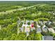 Picturesque neighborhood aerial view of house close to highway and lake at 8213 Swann Hollow Dr, Tampa, FL 33647