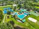 Beautiful community pool area with tennis, pickleball, basketball and playground nearby at 8213 Swann Hollow Dr, Tampa, FL 33647