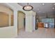 Open kitchen with tile flooring, stainless steel appliances, and ample natural light at 8213 Swann Hollow Dr, Tampa, FL 33647