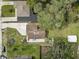 This is an aerial view of the house with a fenced backyard and a shed at 8701 N Packwood Ave, Tampa, FL 33604