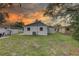 Enjoy the colorful sunset views from this lovely fenced backyard at 8701 N Packwood Ave, Tampa, FL 33604
