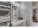 This is a bright bathroom with a large mirror and vanity sink at 8701 N Packwood Ave, Tampa, FL 33604