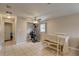 Bright dining area with tile floors, a dining table, and a ceiling fan at 8701 N Packwood Ave, Tampa, FL 33604