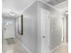 Well-lit foyer with neutral tones, tile flooring, and elegant details providing a welcoming entrance at 901 Strawberry Ln, Brandon, FL 33511