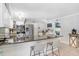 Kitchen featuring granite counters, breakfast bar seating, and stainless appliances at 901 Strawberry Ln, Brandon, FL 33511