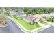 An elevated street view captures a well-maintained home with manicured lawn and landscaping, within a lush green neighborhood at 9067 39Th Street E Cir, Parrish, FL 34219