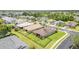 A well-manicured backyard featuring lush green grass and beautiful landscaping, perfect for outdoor enjoyment at 9067 39Th Street E Cir, Parrish, FL 34219