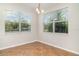 Sunlit dining area featuring tile flooring, white walls, and windows offering views of the outdoors at 9067 39Th Street E Cir, Parrish, FL 34219