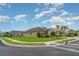 This house has a grassy area, plants and a sidewalk at 9067 39Th Street E Cir, Parrish, FL 34219