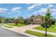 Beautiful single-story home with a well-manicured lawn and lush landscaping in a suburban neighborhood at 9067 39Th Street E Cir, Parrish, FL 34219
