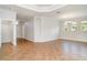 Spacious living room features neutral walls, tile floors, crown molding and natural light from several windows at 9067 39Th Street E Cir, Parrish, FL 34219