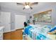 Spacious bedroom featuring a ceiling fan, large closet and a window for natural lighting at 11236 116Th St, Largo, FL 33778