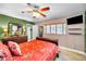 Bedroom featuring a ceiling fan and a window view at 11236 116Th St, Largo, FL 33778
