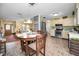 Charming kitchen with stainless steel appliances, tile floors, and a cozy dining area at 11236 116Th St, Largo, FL 33778