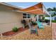 Cozy patio features comfortable seating and stylish awning for relaxed outdoor entertaining at 11236 116Th St, Largo, FL 33778