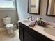 Bathroom features double sink vanity, modern fixtures, and stylish decorative elements at 1137 Highland S St, St Petersburg, FL 33701