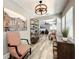 Bright living room featuring hardwood floors, modern decor, and an open layout connecting to other spaces at 1137 Highland S St, St Petersburg, FL 33701