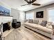 Comfortable living room featuring a fireplace, hardwood floors, and stylish decor, perfect for relaxation at 1137 Highland S St, St Petersburg, FL 33701