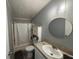 Bathroom featuring a vanity, oval mirror and combined tub and shower at 12319 Memorial Hwy, Tampa, FL 33635