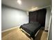 Cozy bedroom with soft carpet, ample natural light, and a comfortable bed at 12319 Memorial Hwy, Tampa, FL 33635