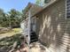 Exterior of home with front porch showing light-colored siding at 12319 Memorial Hwy, Tampa, FL 33635