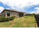 Fenced backyard with a screened porch, offering a secure outdoor living space at 12646 Oak Hill Way, Parrish, FL 34219