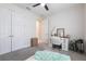 Well-lit bedroom features ample closet space and bright decor with workspace at 12646 Oak Hill Way, Parrish, FL 34219