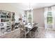 Dining room with large windows and lots of natural light with views of the exterior at 12646 Oak Hill Way, Parrish, FL 34219