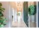 Inviting foyer with decorative accent wall, and arched entry at 12646 Oak Hill Way, Parrish, FL 34219
