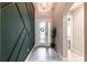 Inviting foyer with decorative accent wall, and open entry at 12646 Oak Hill Way, Parrish, FL 34219