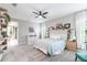 Beautiful bedroom with a large window letting in natural light and decor shelves at 12646 Oak Hill Way, Parrish, FL 34219