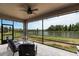 Enjoy outdoor living on the screened lanai with a lovely pond view at 12646 Oak Hill Way, Parrish, FL 34219