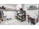 Walk-in closet with clothing, boxes, shelving, desk, and decorative items for storage and organization at 12646 Oak Hill Way, Parrish, FL 34219