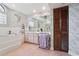 Stylish bathroom showcasing a sunken tub and -and- vanities at 13747 Forest Ridge Ct, Hudson, FL 34667