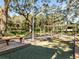 Relax and enjoy a game of bocce ball under the shade of mature trees at 13747 Forest Ridge Ct, Hudson, FL 34667