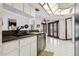 Kitchen sink area overlooking the dining and living areas through the open floor plan at 13747 Forest Ridge Ct, Hudson, FL 34667