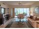 Spacious living room featuring tile floors and access to an outdoor space at 14113 Cypress Cir, Tampa, FL 33618