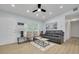 Bright living room with modern furniture, neutral walls, and contemporary decor at 1608 Carlos Ave, Clearwater, FL 33755
