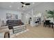 Open concept living room and kitchen with recessed lighting and modern decor at 1608 Carlos Ave, Clearwater, FL 33755
