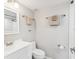 Clean bathroom with a white vanity, modern fixtures, and convenient towel racks at 214 Meadow Ln # 214, Oldsmar, FL 34677