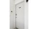 Modern front door with electronic lock and doorbell at 214 Meadow Ln # 214, Oldsmar, FL 34677