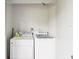 Functional laundry area with modern washer and dryer at 214 Meadow Ln # 214, Oldsmar, FL 34677