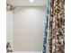 Bright shower with fresh white tile, modern fixtures, and a stylish shower curtain at 214 Meadow Ln # 214, Oldsmar, FL 34677